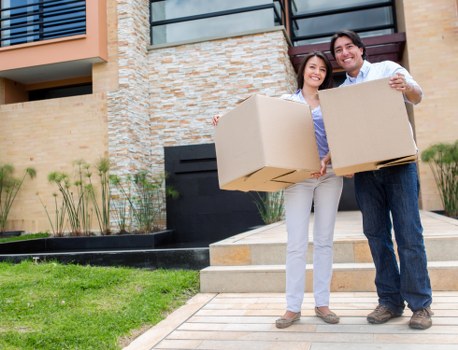 Insurance and safety-focused moving staff handling items carefully